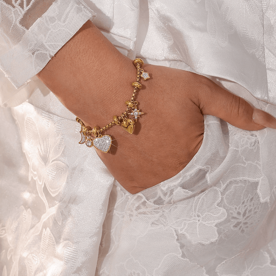 Model wearing gold Lockit Love Heart Pendant Titanium Steel Bracelet