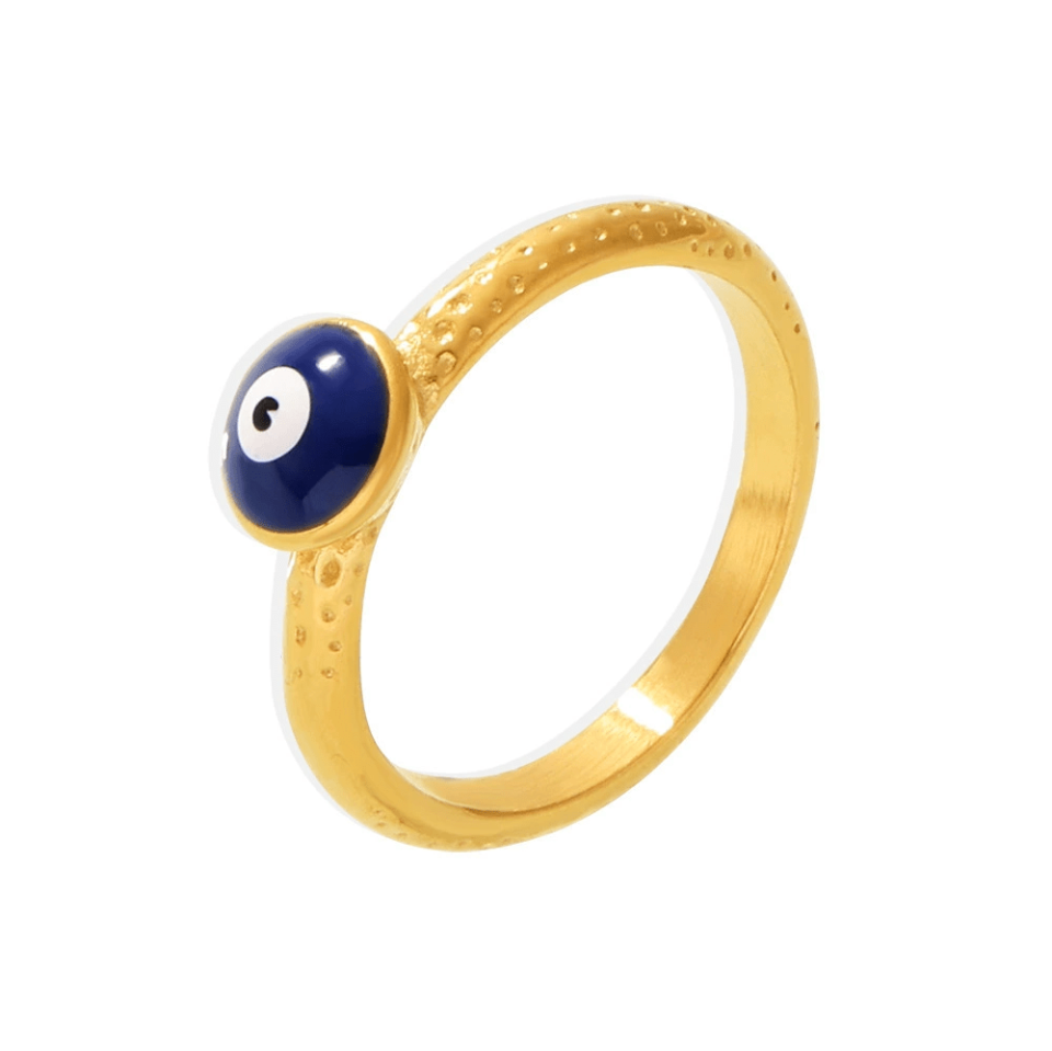 Isolated 316L stainless steel evil eye ring with cobalt blue enamel on white background