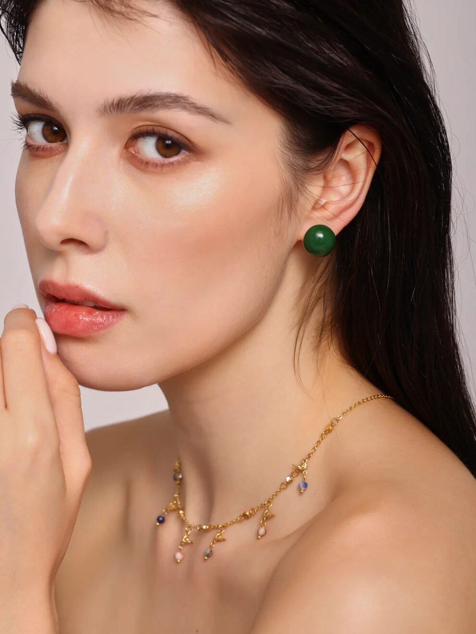 Detailed View of Green Enamel Pearl Drop Earrings with Intricate Copper Design