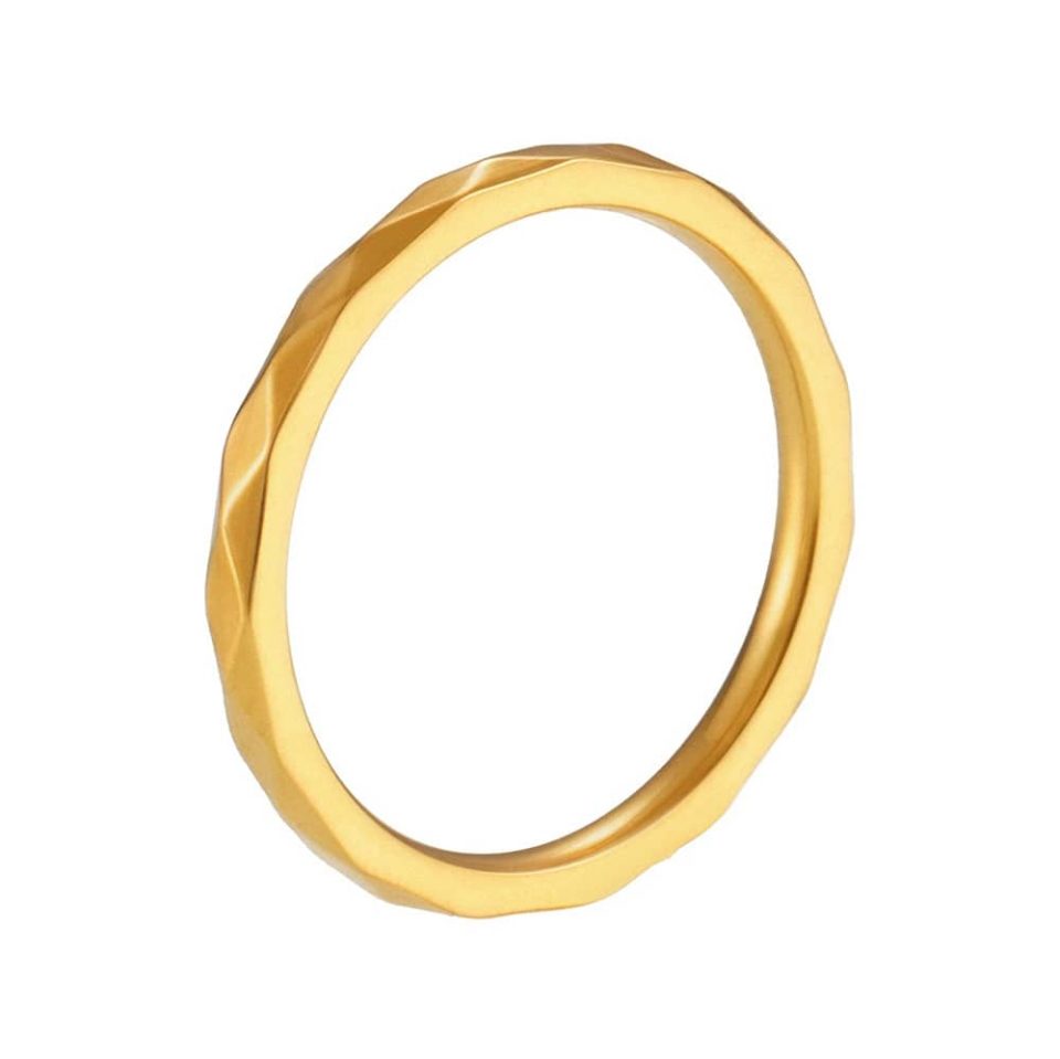 Gold faceted lattice voyager ring flatlay, showcasing hexagonal geometric design and stackable versatility for minimalist jewelry lovers.