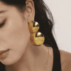 F1452 - Gold Tone Bold Double Disc Huggie Earrings