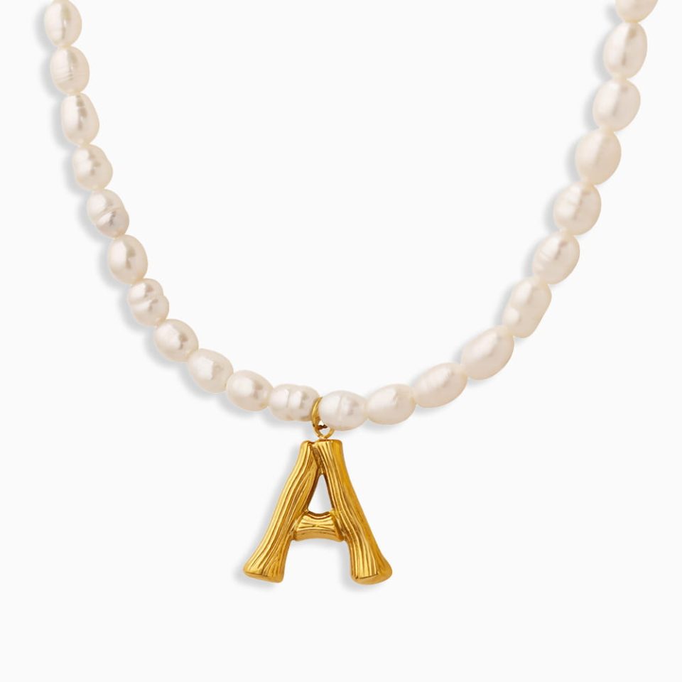 Celestial initial necklace with zodiac charm and pearl pendant in 18K gold plated stainless steel