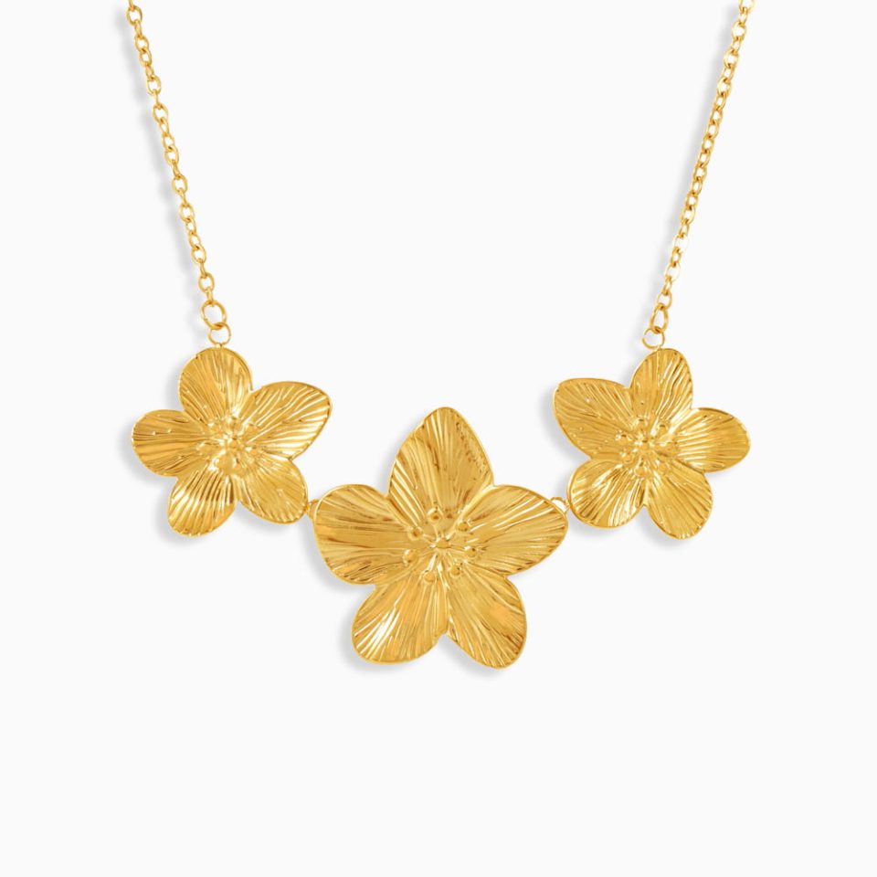 gold flower pendant necklace with stainless steel ring detail and lasting shine finish