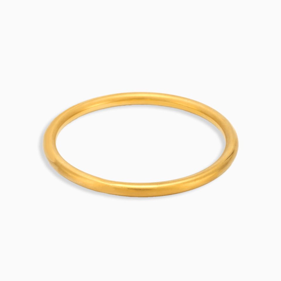 Minimalist gold cuff bangle on white background, 18K gold plated stainless steel