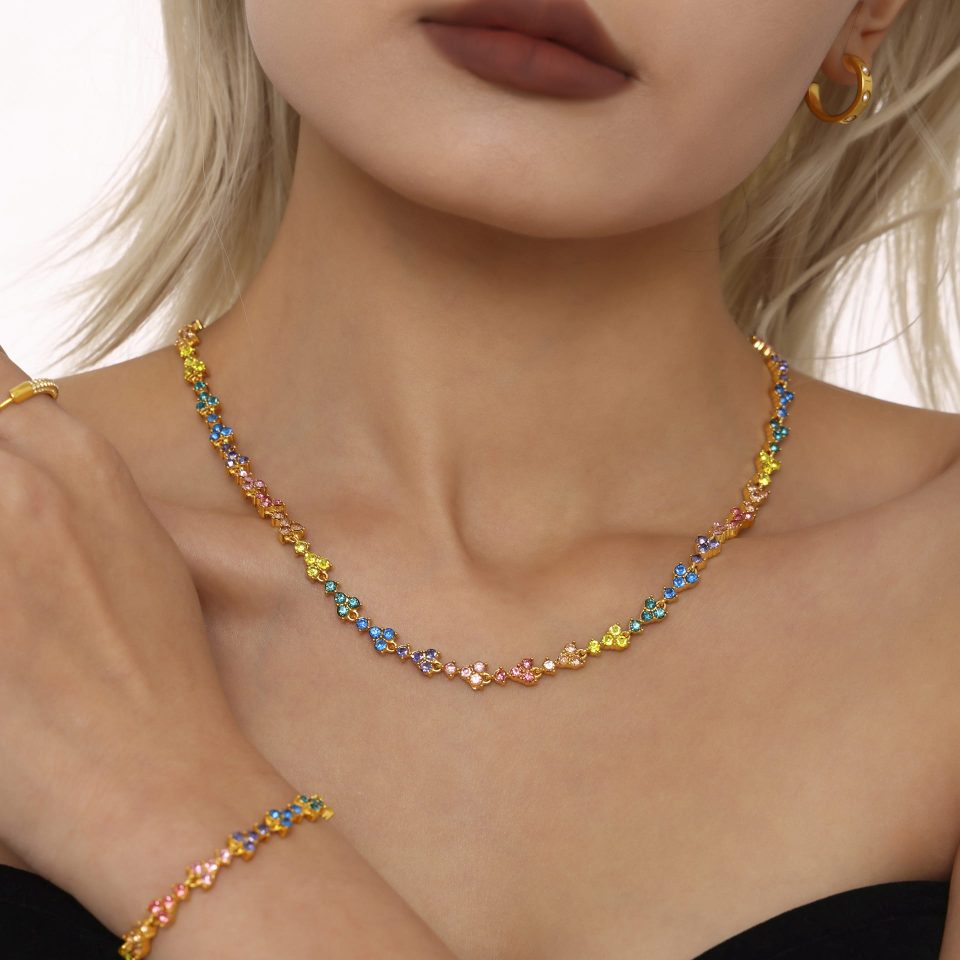 model wearing colorful dopamine cubic zirconia necklace with vibrant stones