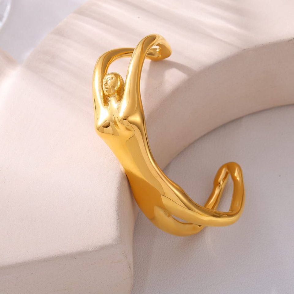 Z376 Gold Cuff Bangle Flat Lay - Luxury Jewelry Styling with Minimalist Accessories