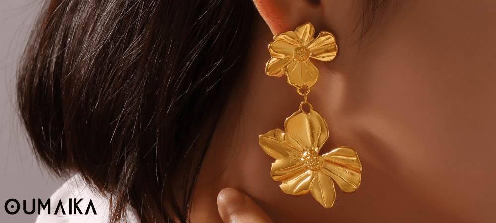 Statement dangler earrings styled with formal evening wear