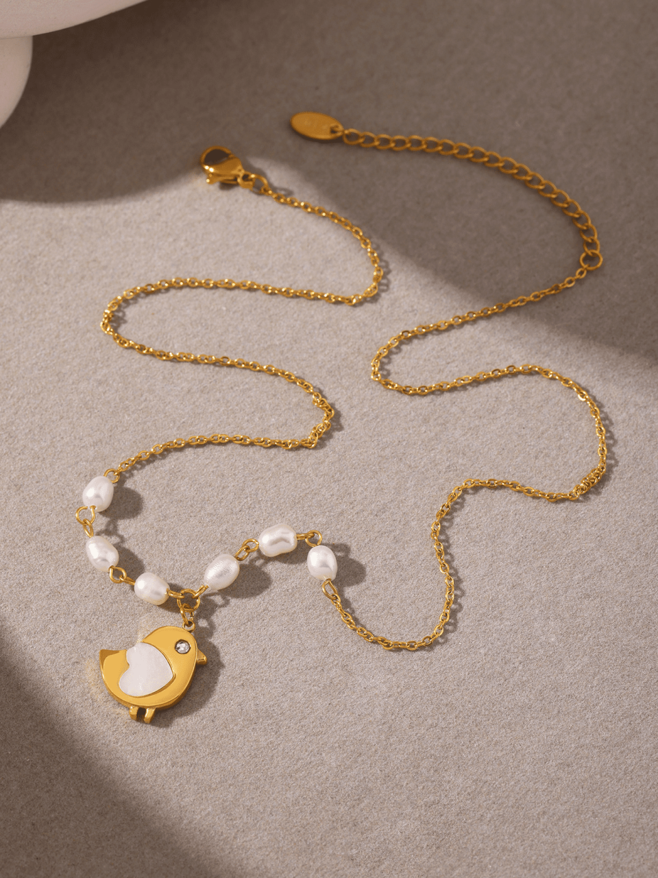 A model wearing the Chick Shell Pearl Necklace - 18K Gold Plated Shell Jewelry, showcasing its elegant design and perfect fit.