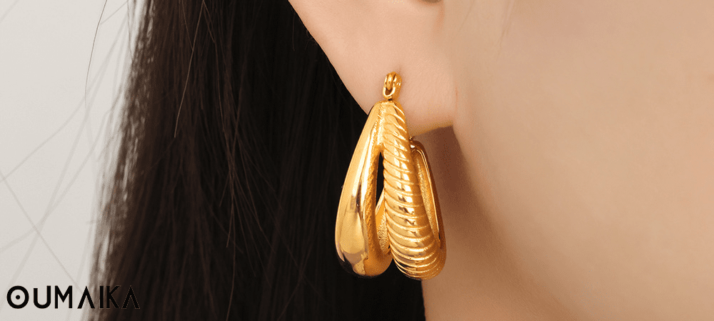 Minimalist dangler earrings styled with a casual outfit