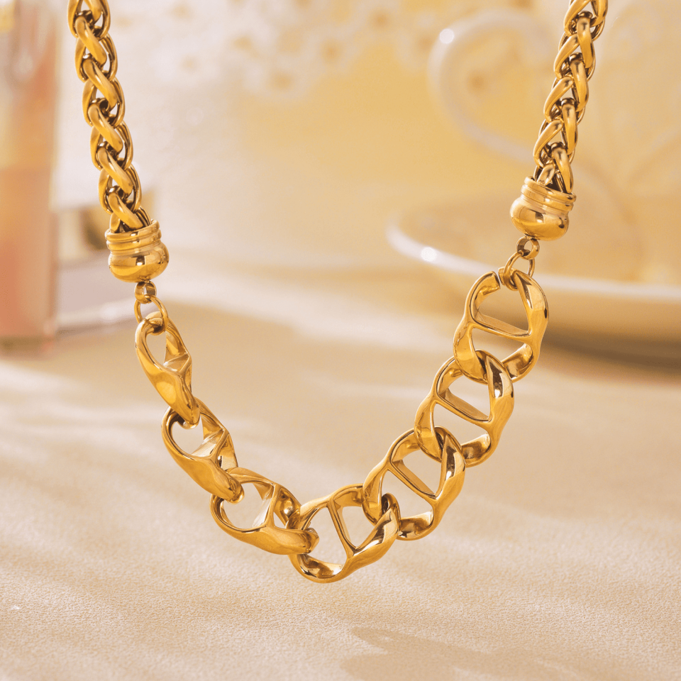 Gold enamel heart necklace styled with cashmere scarf and latte - cozy winter gifting inspiration