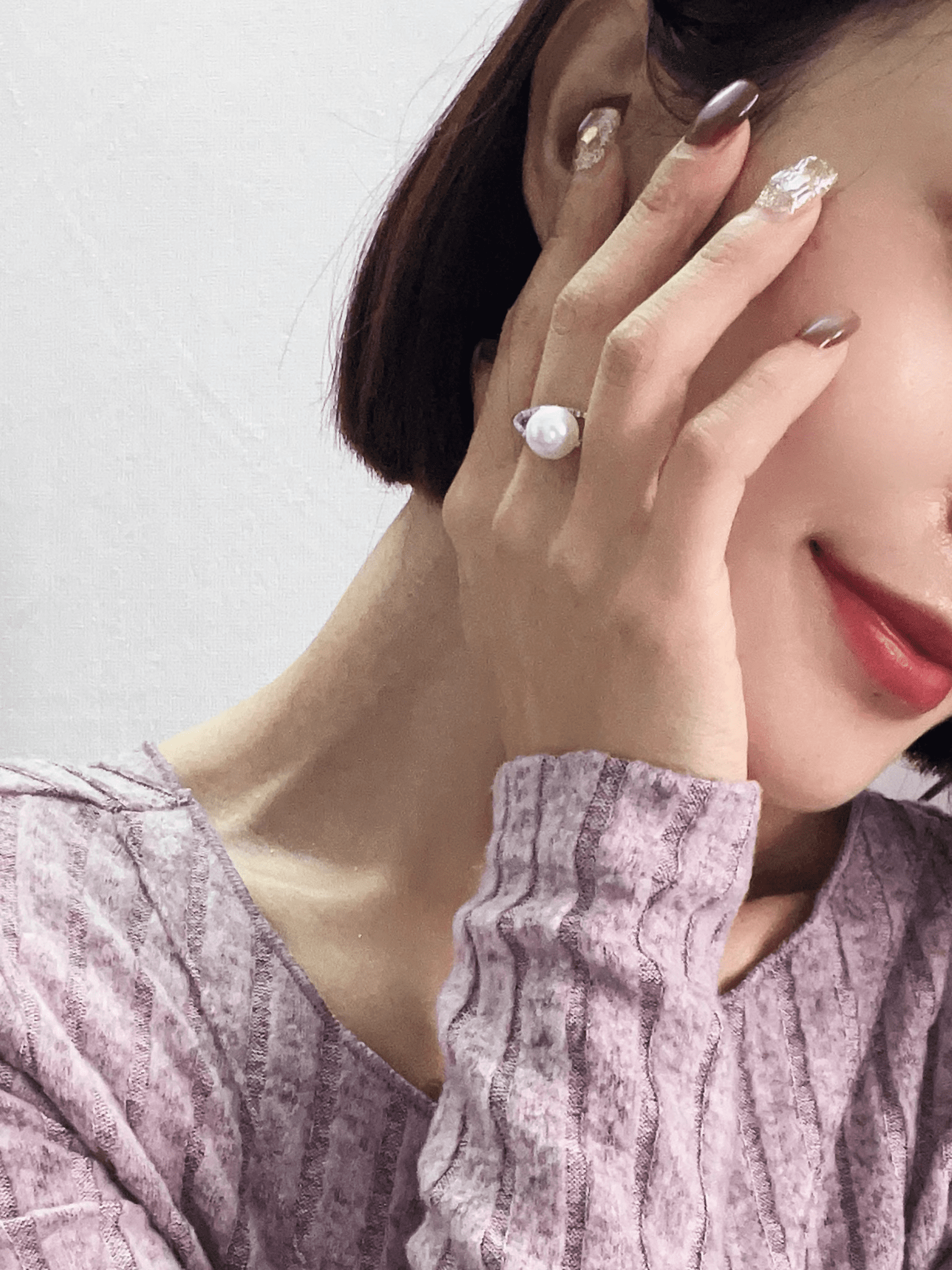 Pearl Ring styled with evening dress and gold earrings