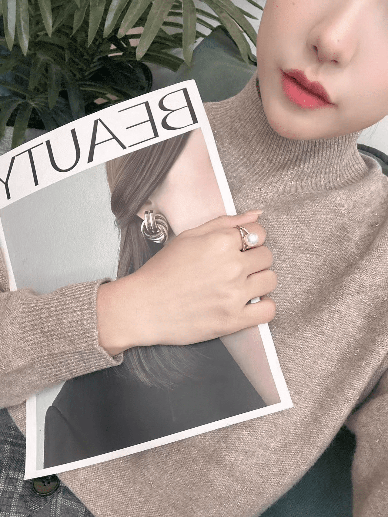 Pearl Ring stacked with bracelets and layered necklaces for casual look
