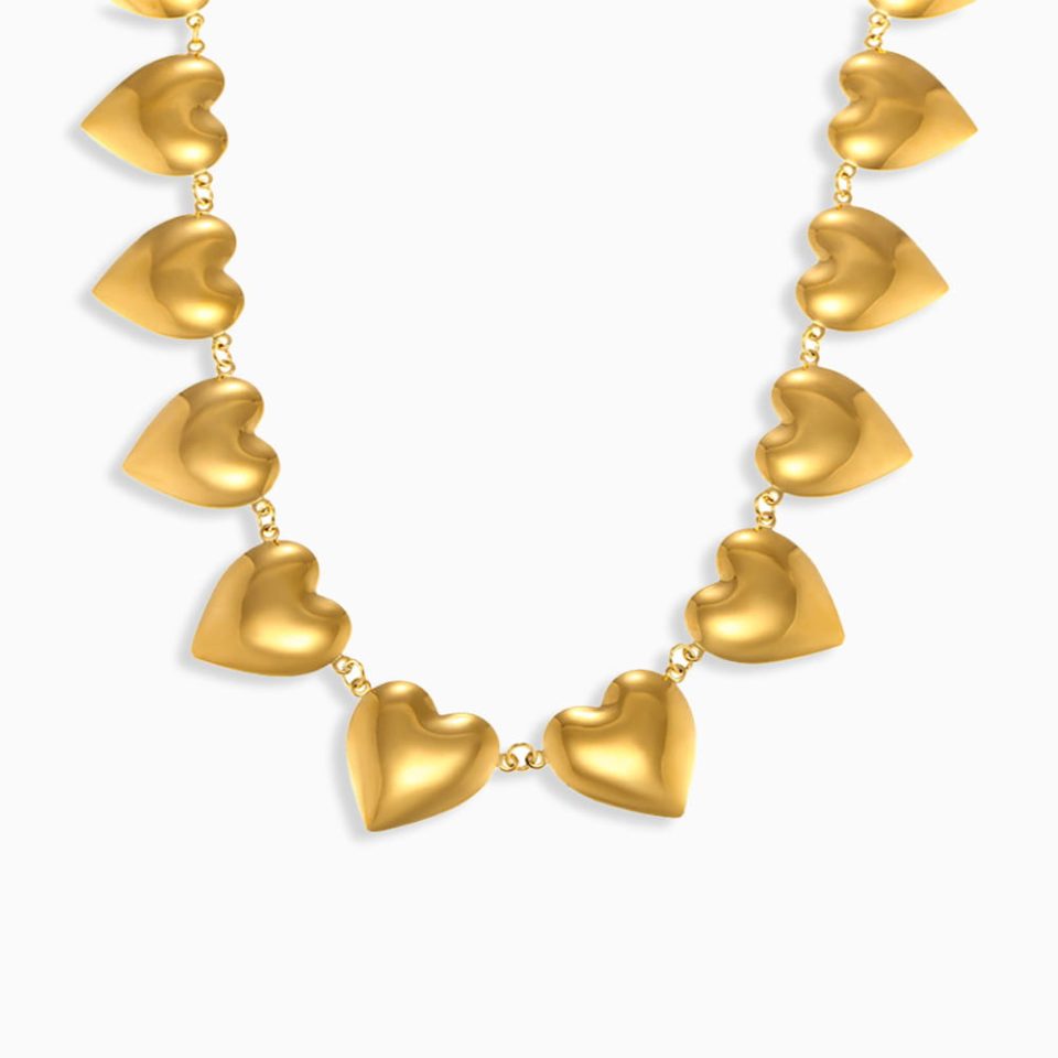 Gold heart chain choker necklace made from stainless steel, featuring bold link design and heart centerpiece