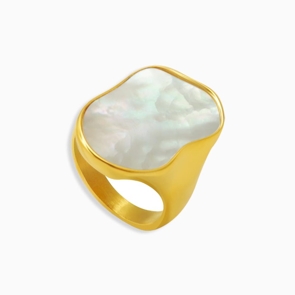 Chunky gold-plated stainless steel ring with irregular pearl design on white background.