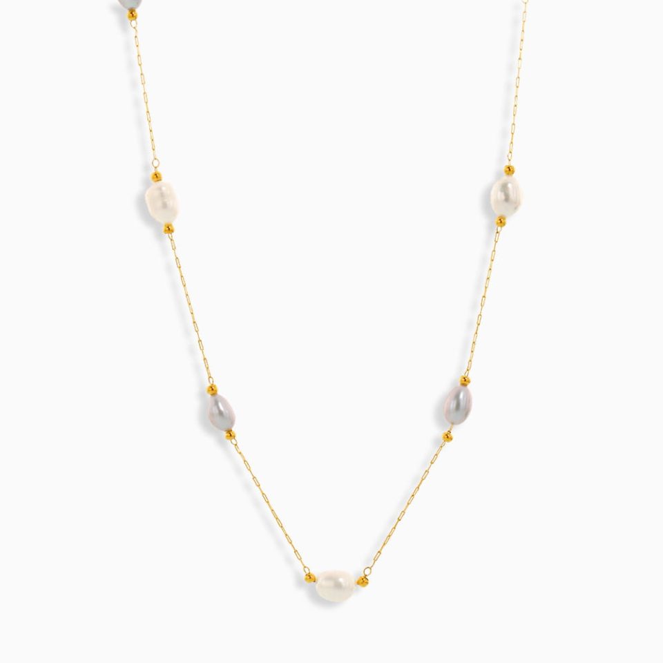 Dainty freshwater pearl necklace with stainless steel chain, white rice-shaped pearls on white background