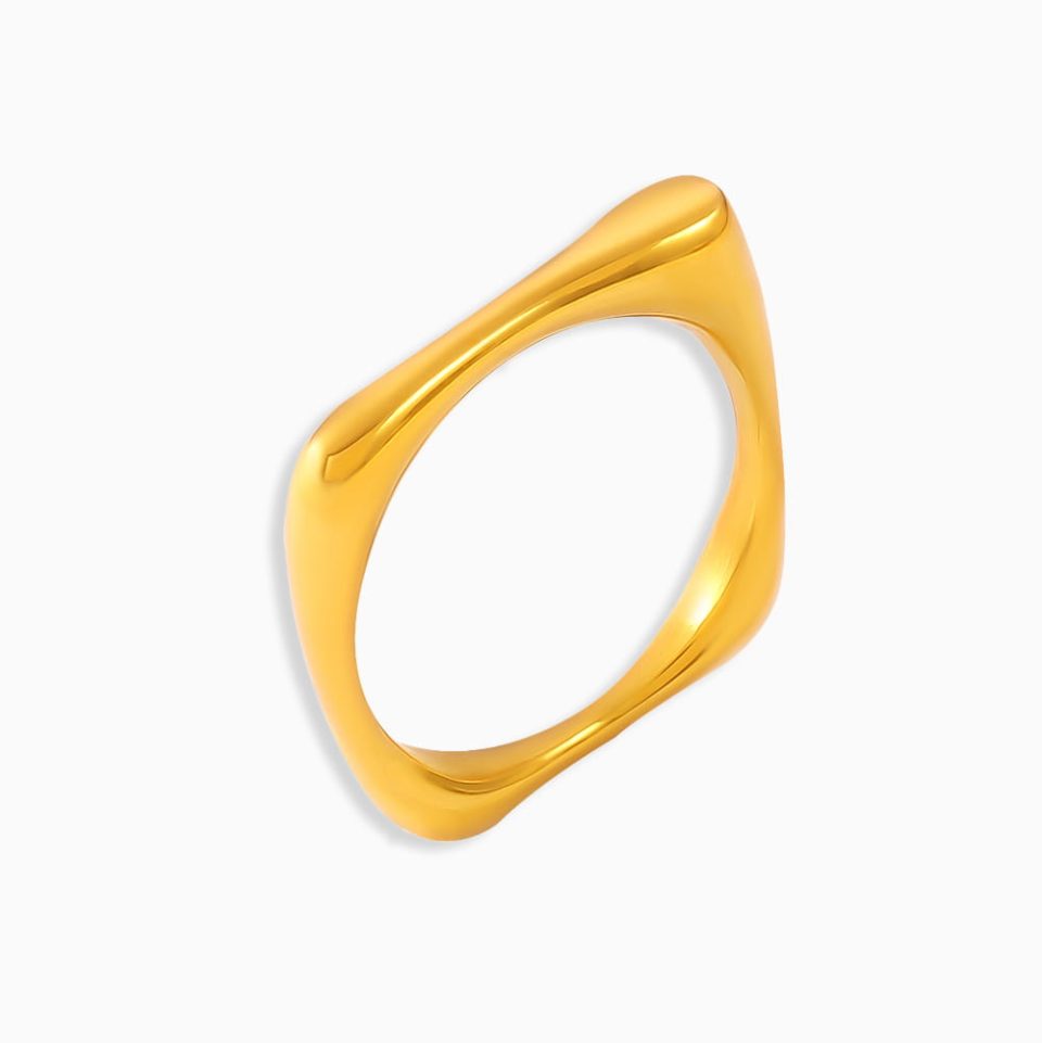 Main product image of gold geometric statement ring on white background