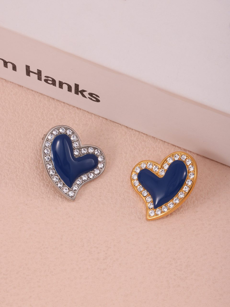 Woman Wearing F1315 Gold Heart Hoop Earrings - Rhine Blue CZ Accents for Evening Out