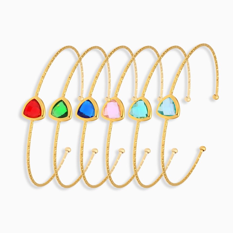 Gold stainless steel cuff bracelet with faceted Czech sea glass stones in green, red, deep blue, pink, light blue, and light green