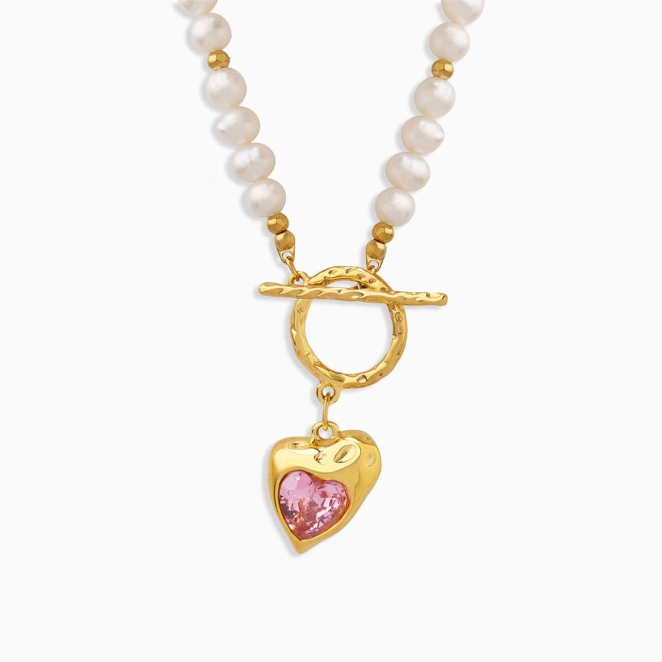 Gold Freshwater Pearl Necklace with Pink CZ Heart Charm on White Background
