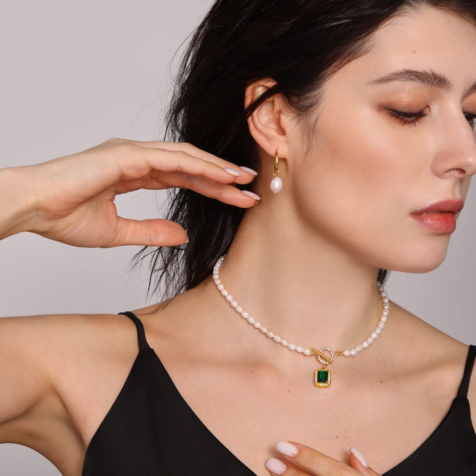 Model wearing green CZ baroque pearl choker necklace with stainless steel OT clasp