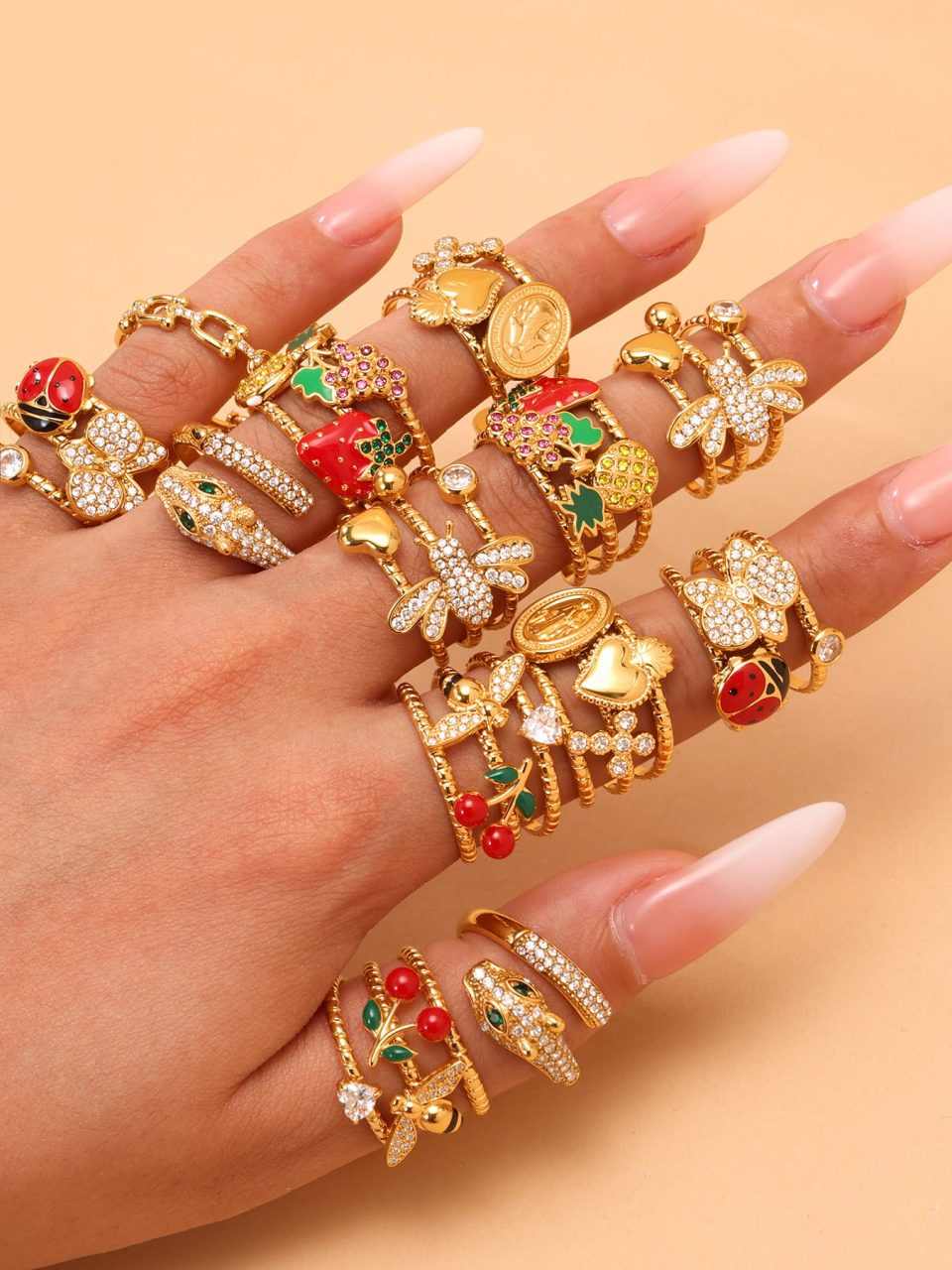 Model wearing the Sacred Heart Medal Open Ring in gold stainless steel