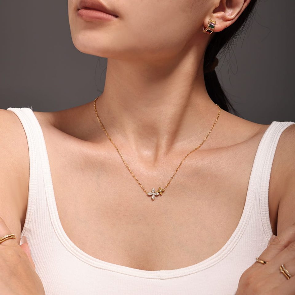 Model wearing a gold zircon necklace TXP166