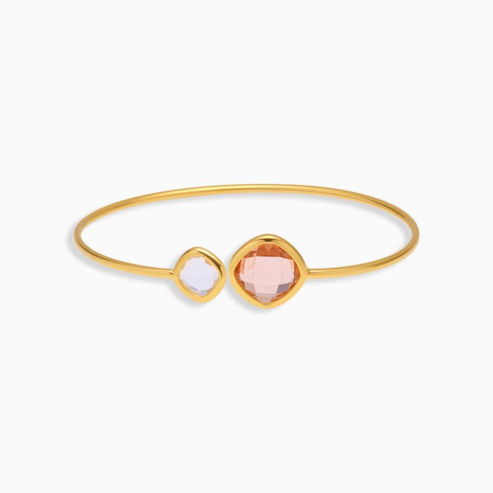 Gold stainless steel cuff bangle with faceted pink Czech crystal