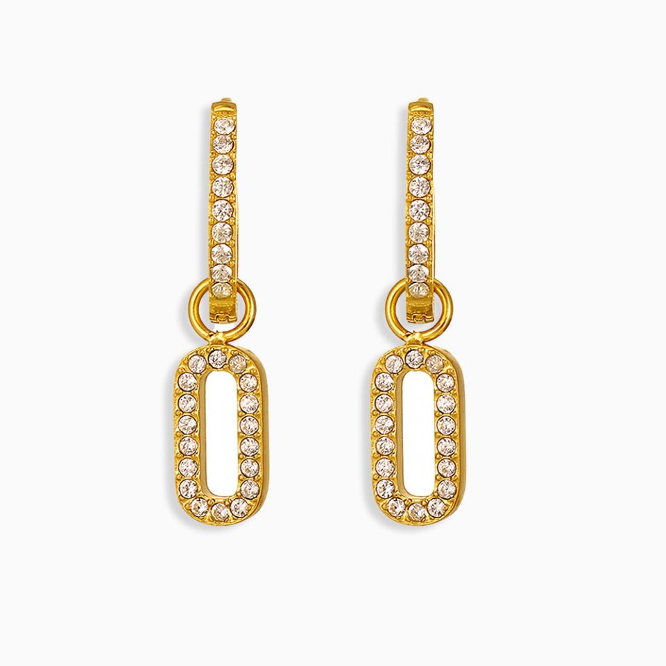 Gold oval CZ drop earrings on white background – stainless steel jewelry