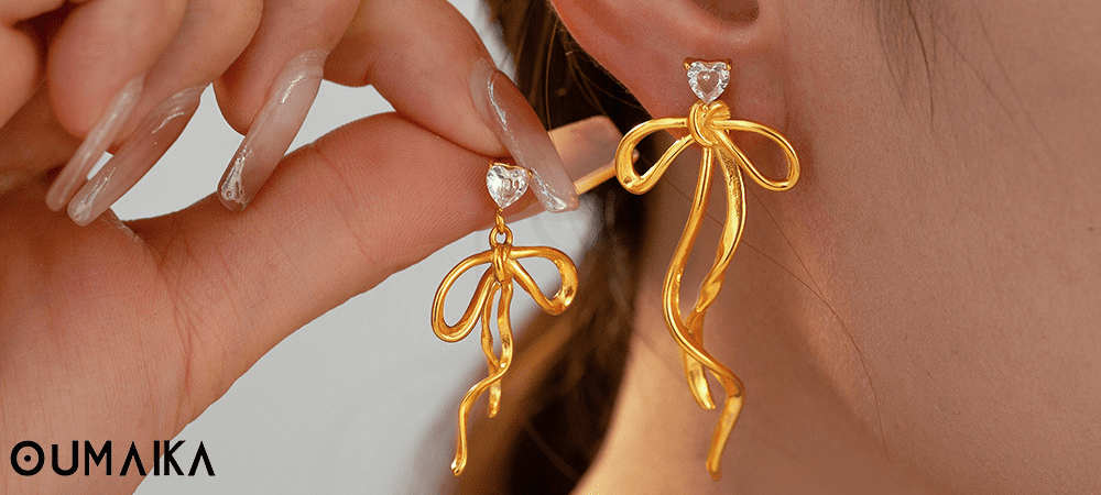 Boho Tassel Earrings for Summer Vacations – 2025 Trend Outdoor shot of a model wearing boho-style tassel earrings with sunglasses and hat.
