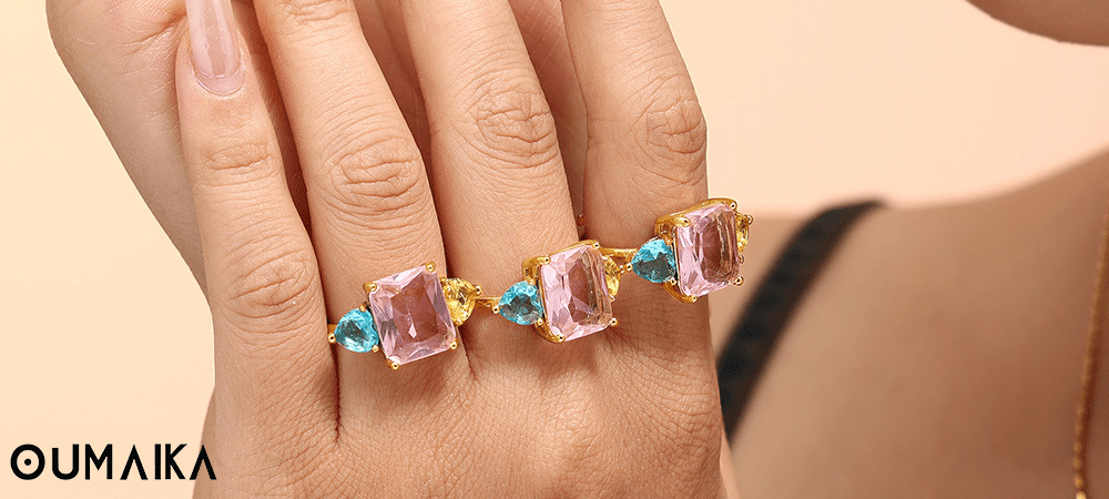 Model Stacking 5A CZ Rings on Five Fingers – Oumaika Jewelry Model wearing 5A CZ rings stacked on all five fingers – luxury cubic zirconia jewelry styling