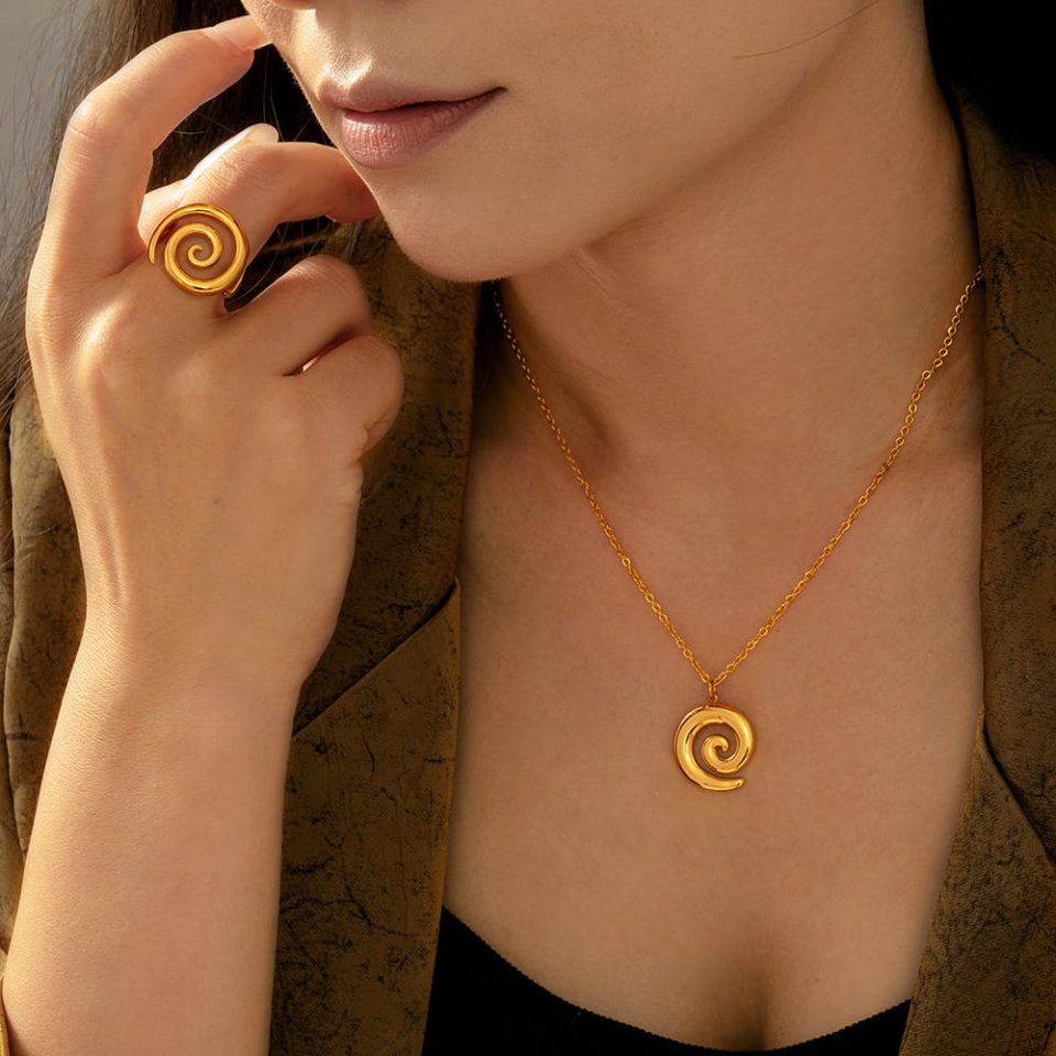 Model Wearing Gold Spiral Pendant Necklace – Elegant Everyday Style
