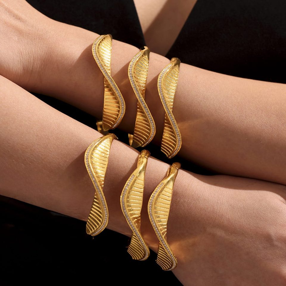 Model wearing a gold zircon bangle Z453