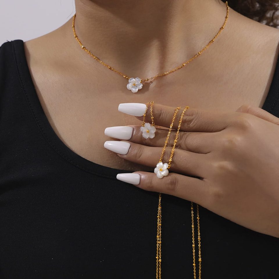Model wearing flower pendant necklace P1834