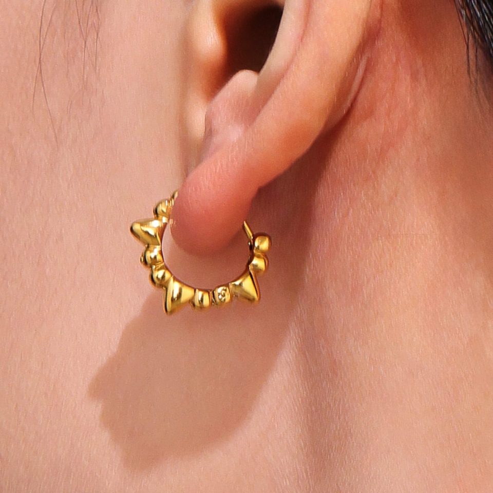 Model wearing gold earrings F325-