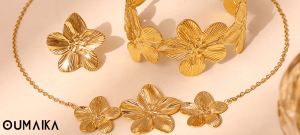Close-up of zircon-studded stainless steel flower necklace under warm lighting highlighting tarnish-resistant shine and petal details