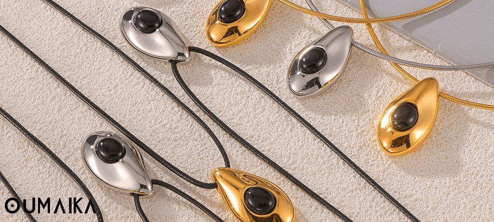 Lifestyle scene with layered stainless steel necklaces worn casually