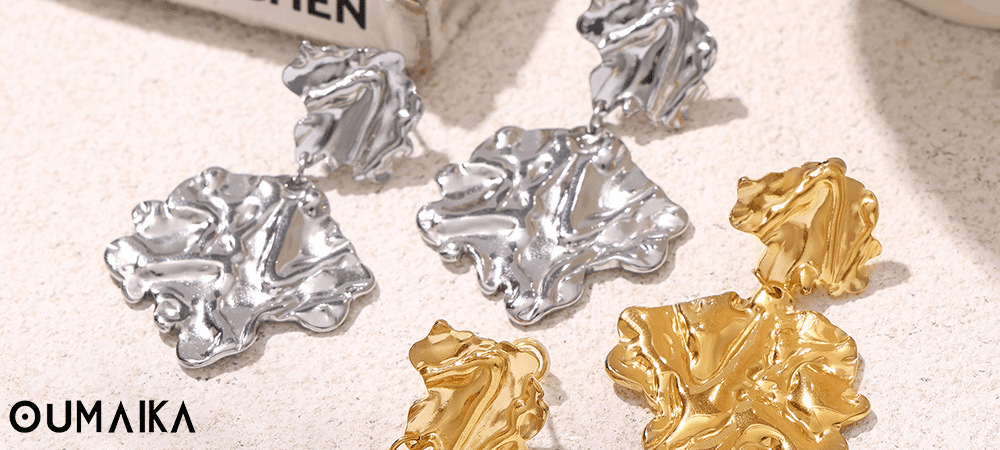Warm golden scene showcasing elegant dangler earrings crafted from hypoallergenic stainless steel