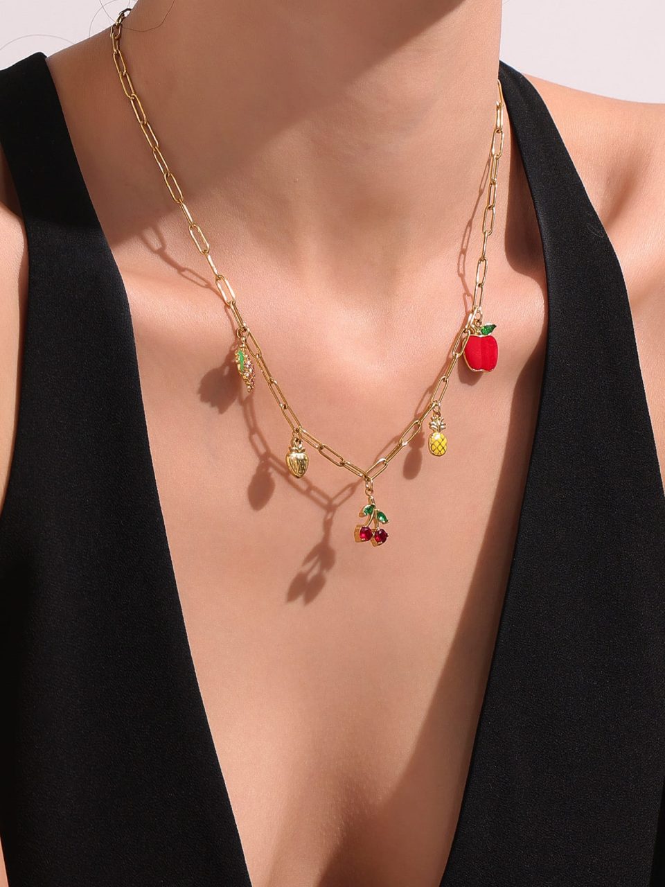 Model wearing a gold DIY fruit pie necklace P1053