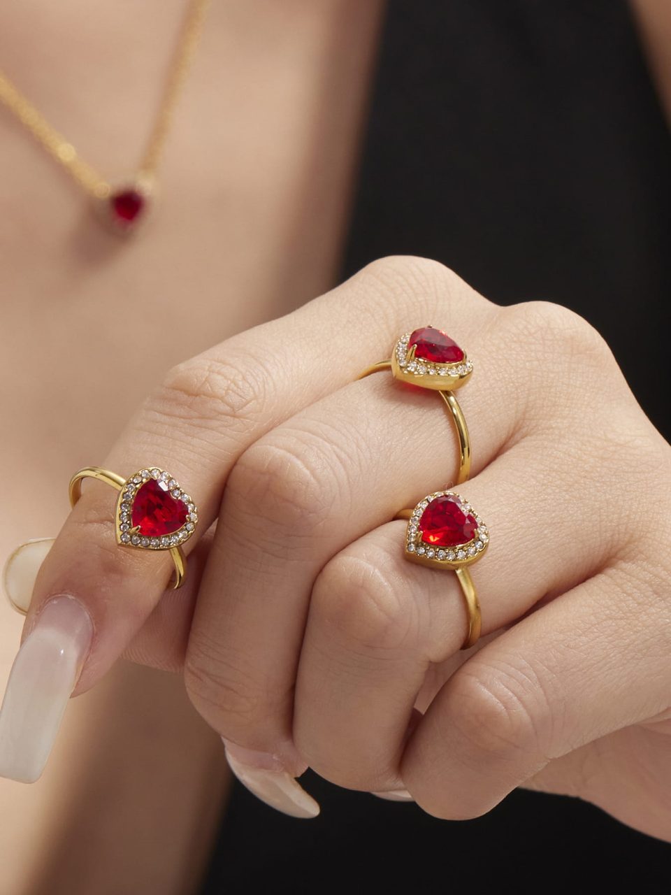 Model wearing the Red Heart Nugget Ring in Gold Stainless Steel with Cubic Zirconia, Size 7
