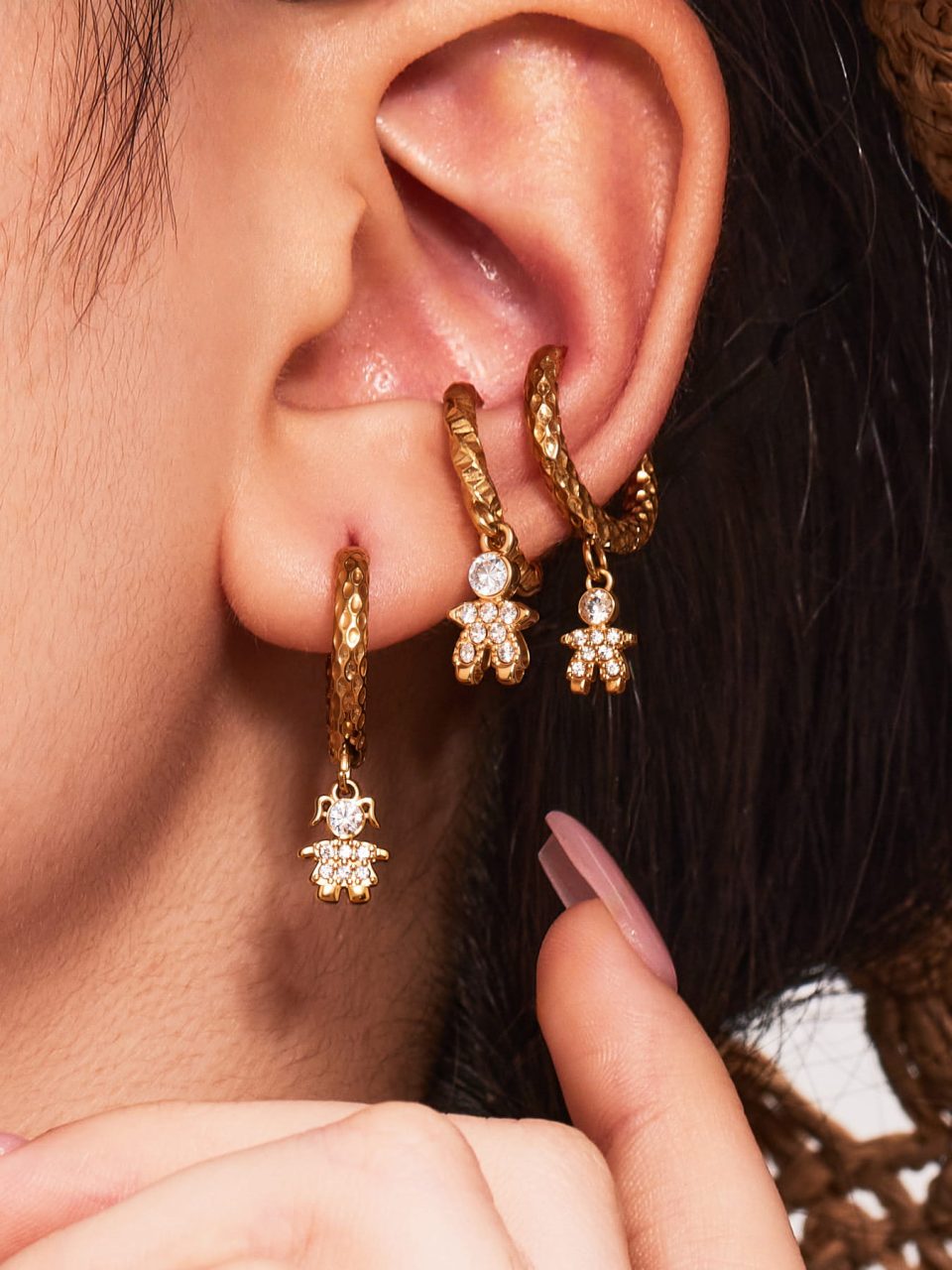 Model wearing Fashion Little Prince and Rose Zircon Diamond Earrings in gold