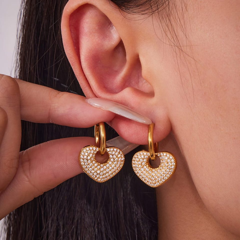 Model wearing gold zircon earrings F621
