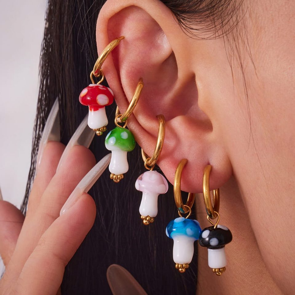 Model wears mixed color earrings F609-