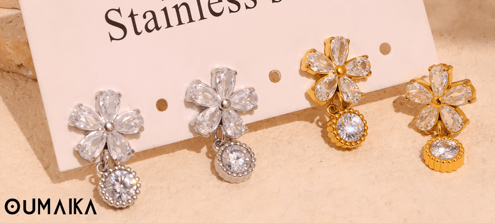 Hypoallergenic floral crystal dangle earrings in silver and gold for sensitive ears