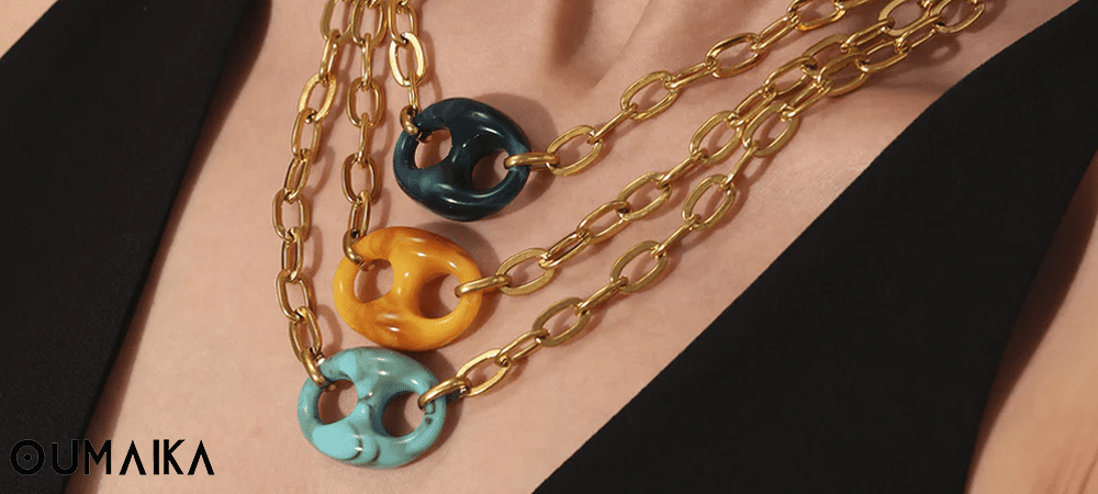 Artisan crafting jewelry from recycled stainless steel with sustainability certificates