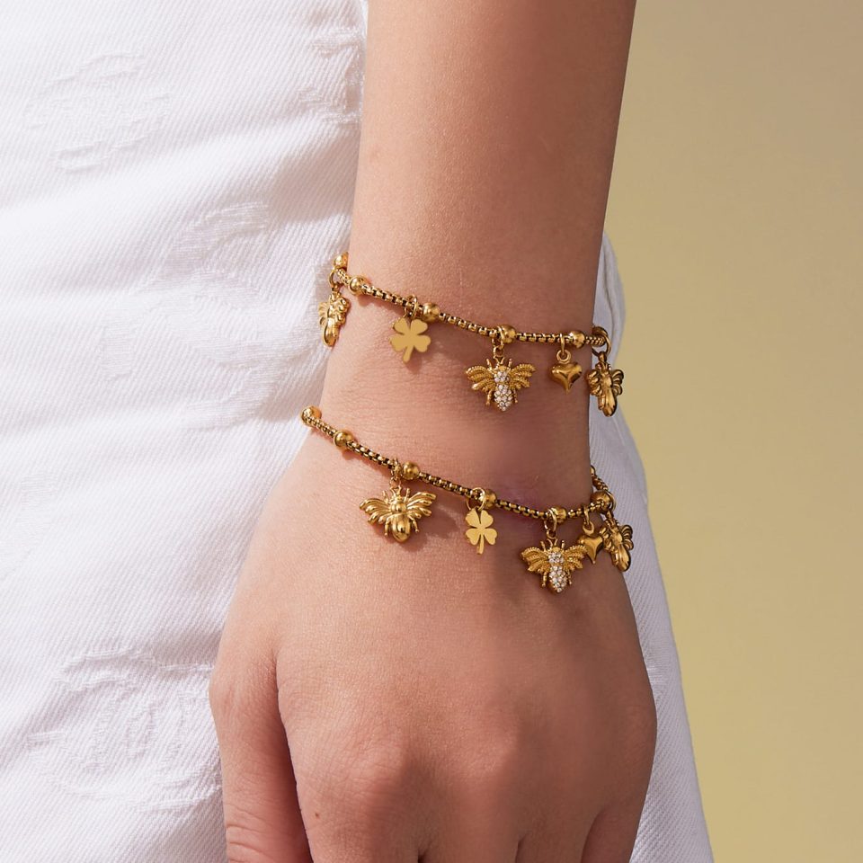 Model wearing a gold DIY bracelet TXE387