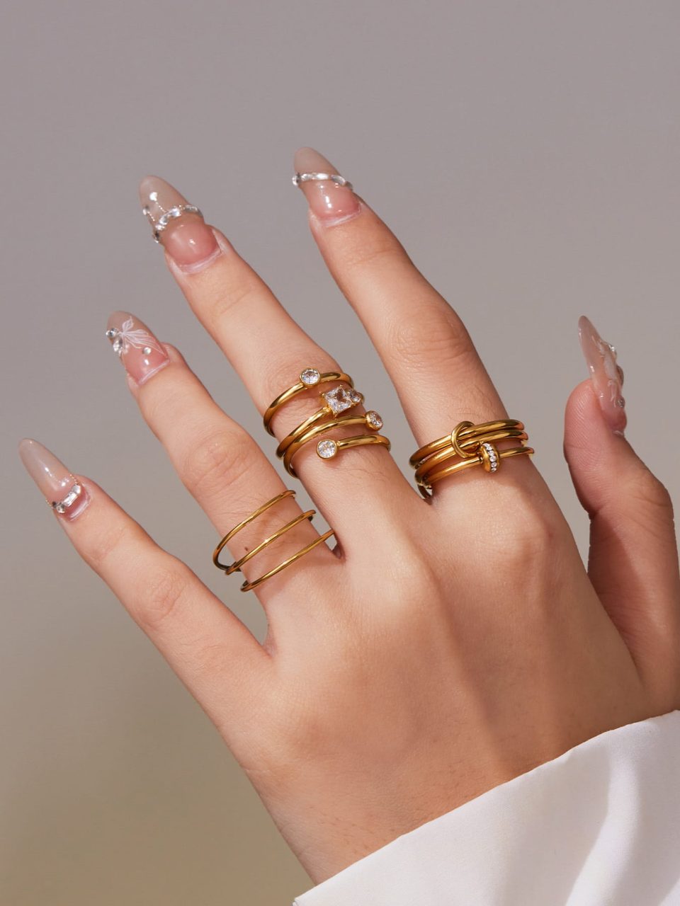 Model wearing a gold zircon ring A309-A