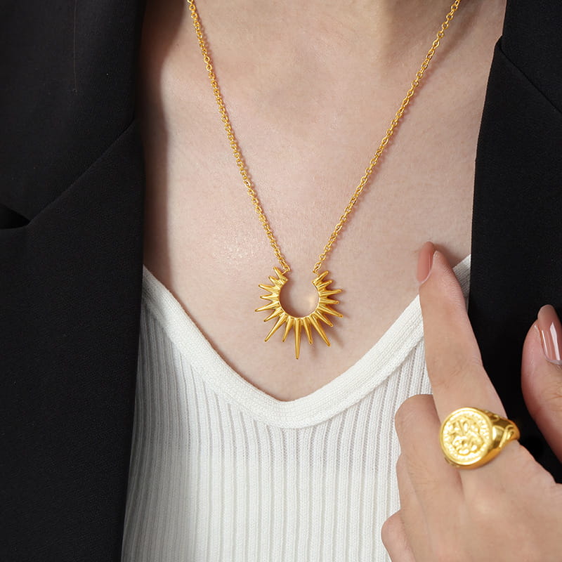 Geometric Radiance Pendant Necklace styled with a blazer, stainless steel gold necklace for modern women